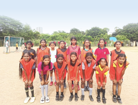 Girls football team participating in the Chennai Kaalpandhu League